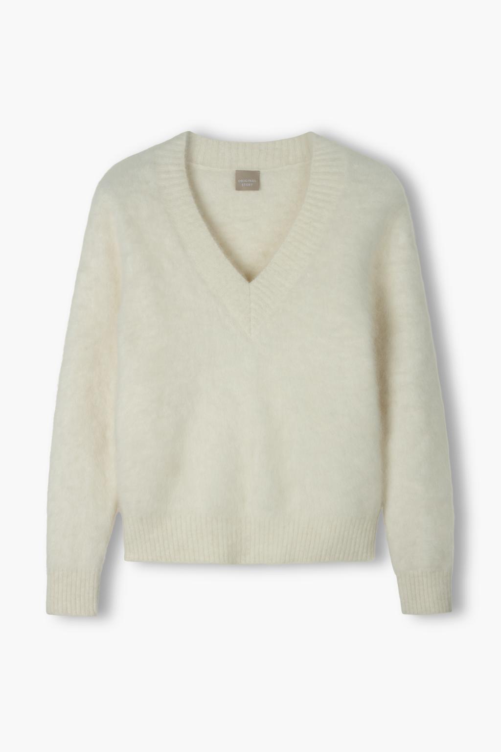 Valkoinen alpakkasekoiteneule v-kaula-aukolla